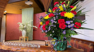 CUUCWP Interior with flowers and a table